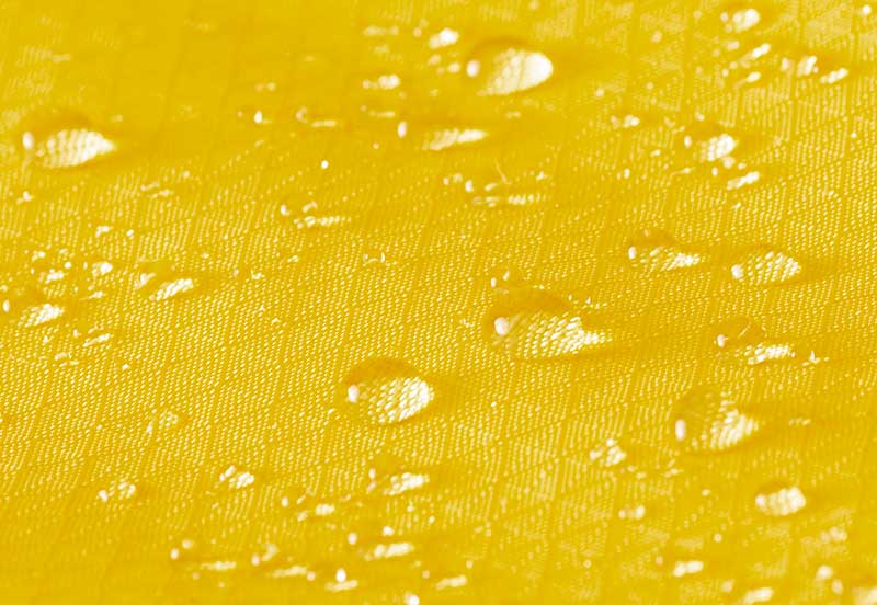 a close up of a yellow liquid